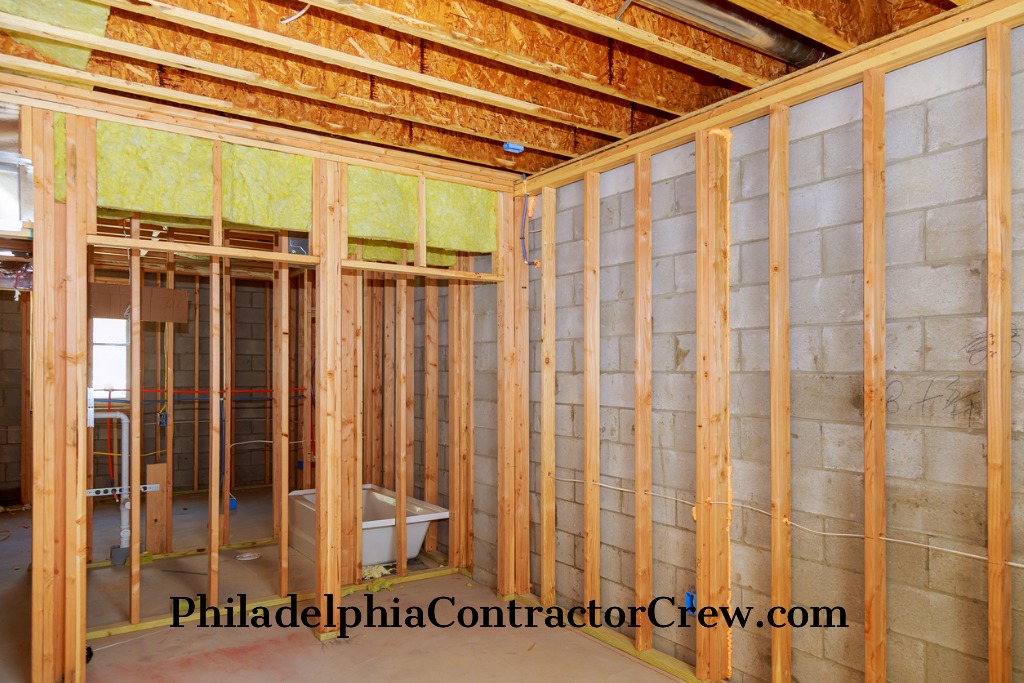 remodeling-a-philadelphia home-bathroom-moving-plumbing-for-new-sinks-picture-id938911406